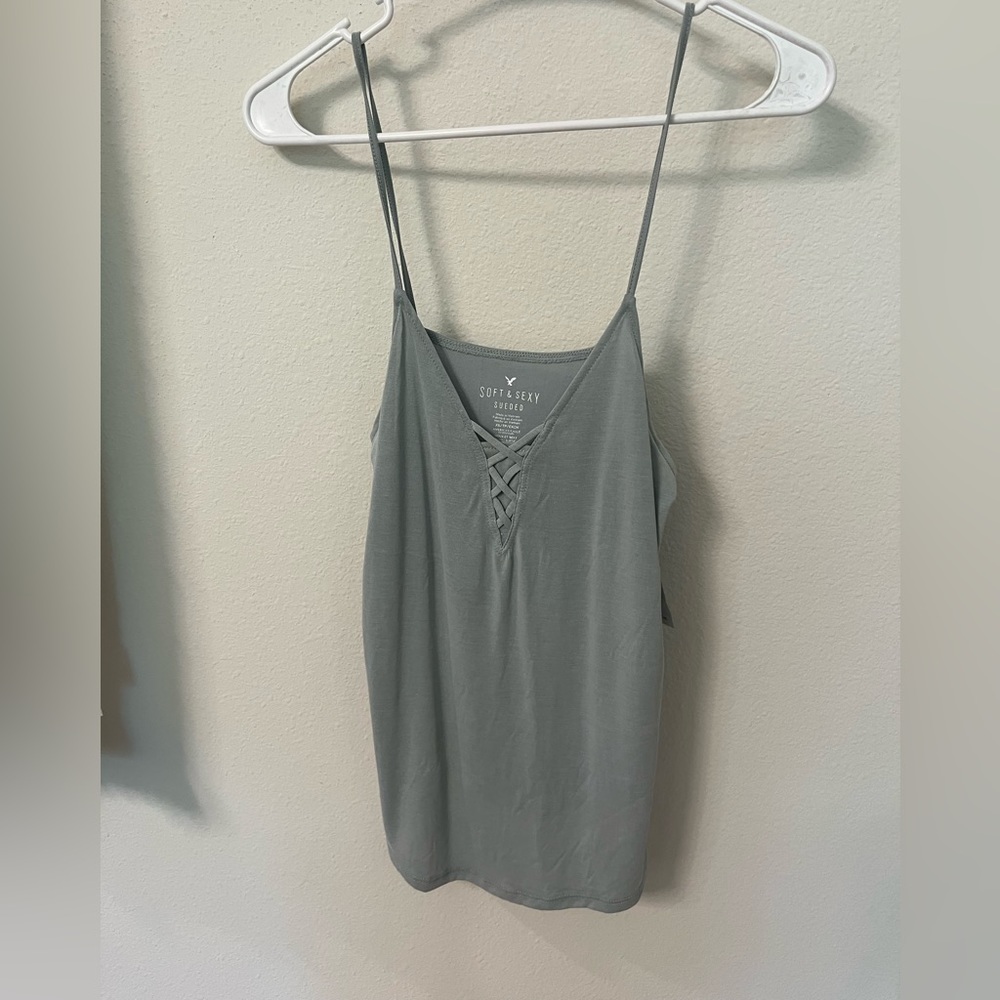 American eagle brand new with tags! Teal shirt in a size Xs.